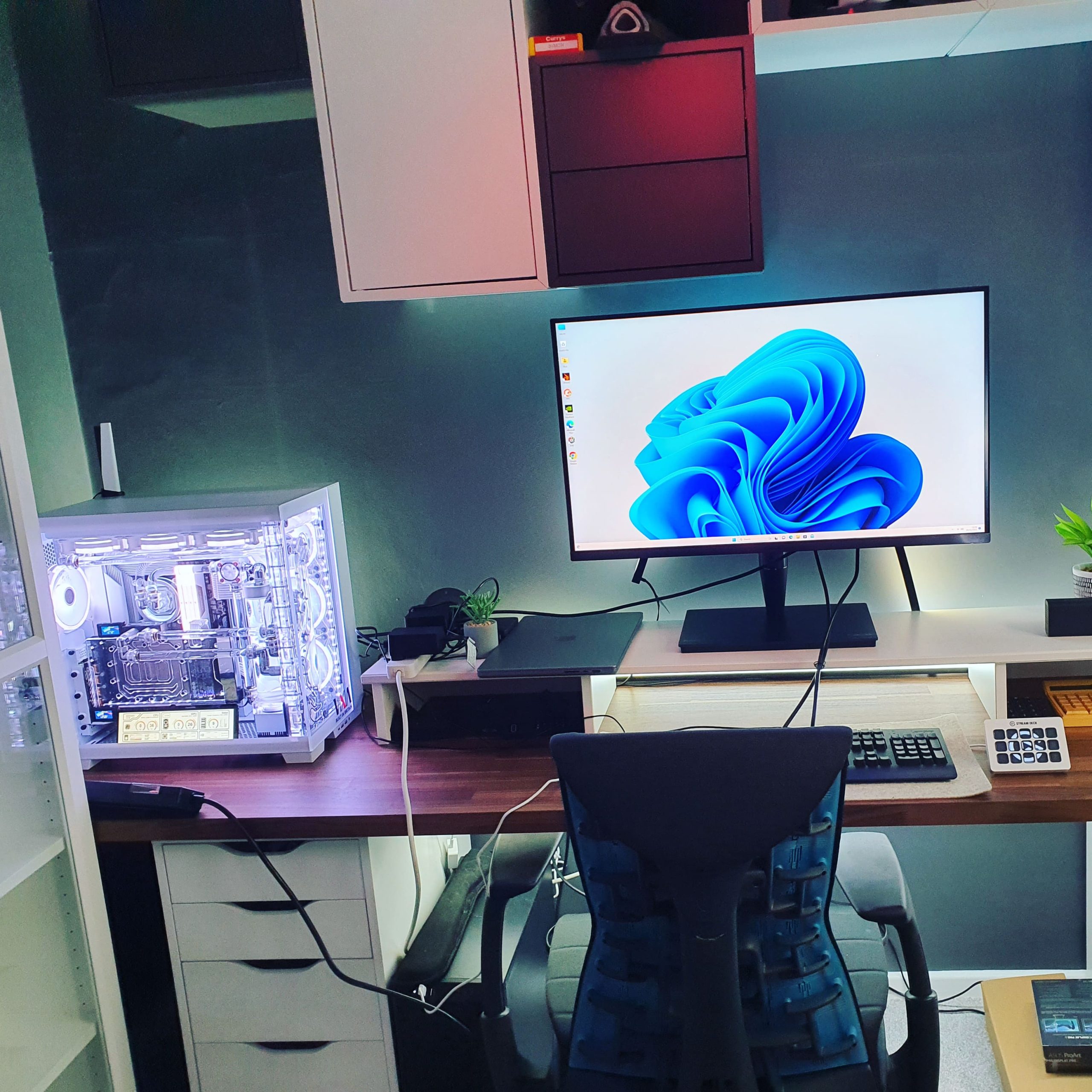 VIXIA custom watercooled gaming PC installed and ready to use at a customer home