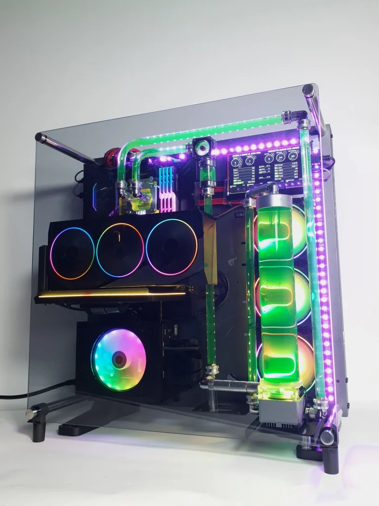 VIXIA VXS-150 black open-frame custom watercooled gaming PC with neon green coolant, hardline liquid cooling and RGB lighting.